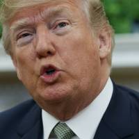 U.S. President Donald Trump talks with reporters during a meeting Thursday with Irish Prime Minister Leo Varadkar in the Oval Office of the White House in Washington. In a series of blistering tweets on Saturday, MTrump falsely asserted that the House Intelligence Committee has concluded there was no collusion between his presidential campaign and Russia. | AP