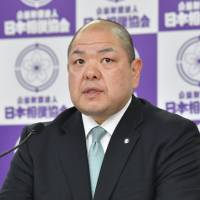 Japan Sumo Association Chairman Hakkaku holds a news conference Monday after he was elected to a third term head of the JSA. | KYODO