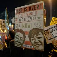 Protesters stage an anti-Abe demonstration near the prime minister\'s official residence in Tokyo Monday. | AFP-JIJI