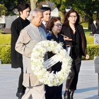 Muhammad Yunus, winner of the 2006 Nobel Peace Prize, visits Hiroshima Peace Memorial Park on Tuesday. | KYODO