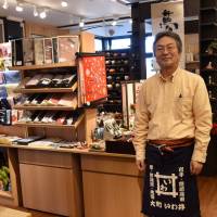 Seitoku Iwai, a 12th-generation shop owner in Rikuzentakata, Iwate Prefecture, says there\'s a certain joy in re-creating a community from scratch. | SATOKO KAWASAKI