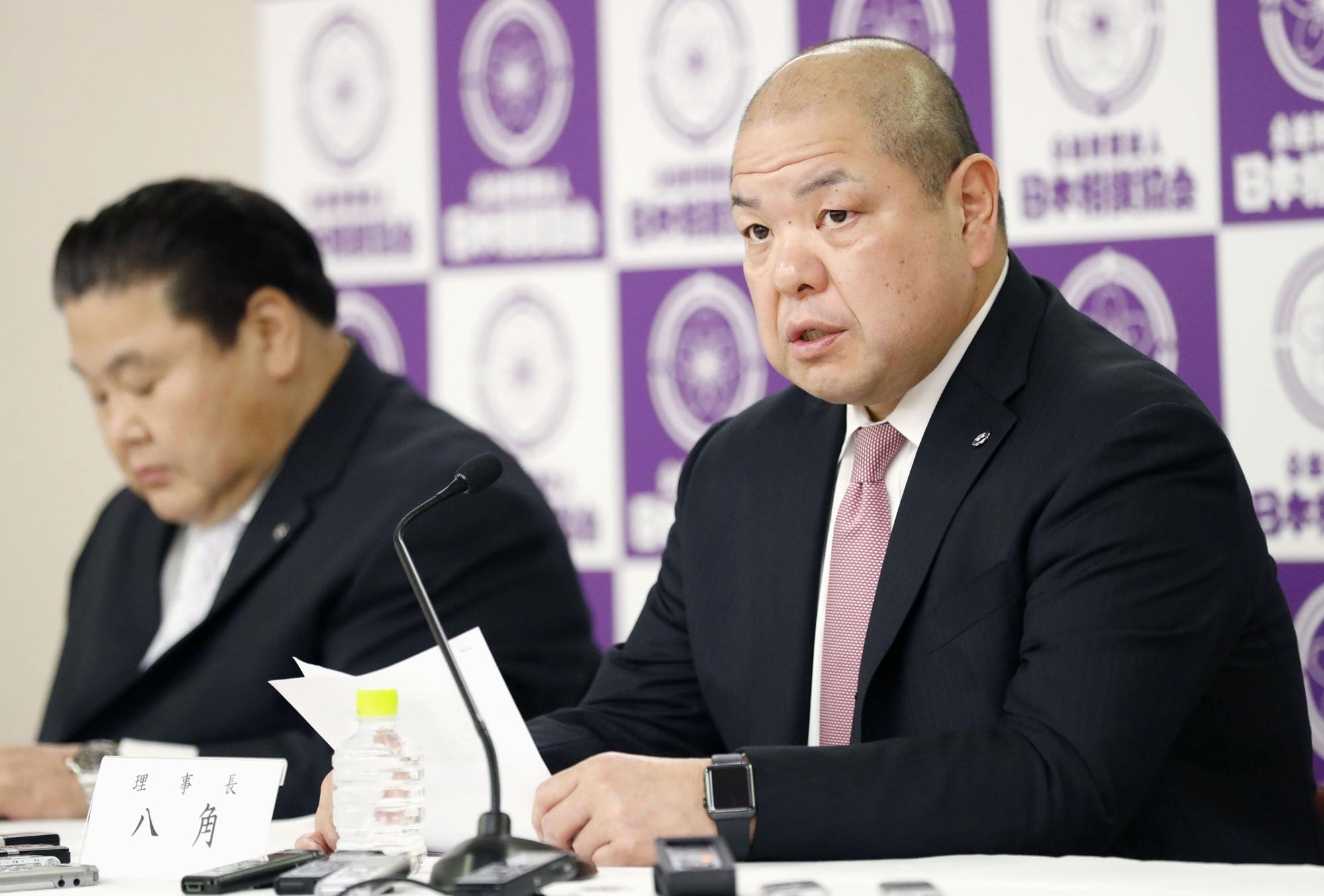 Japan Sumo Association Chairman Hakkaku addresses a news conference in Tokyo on Thursday. | KYODO