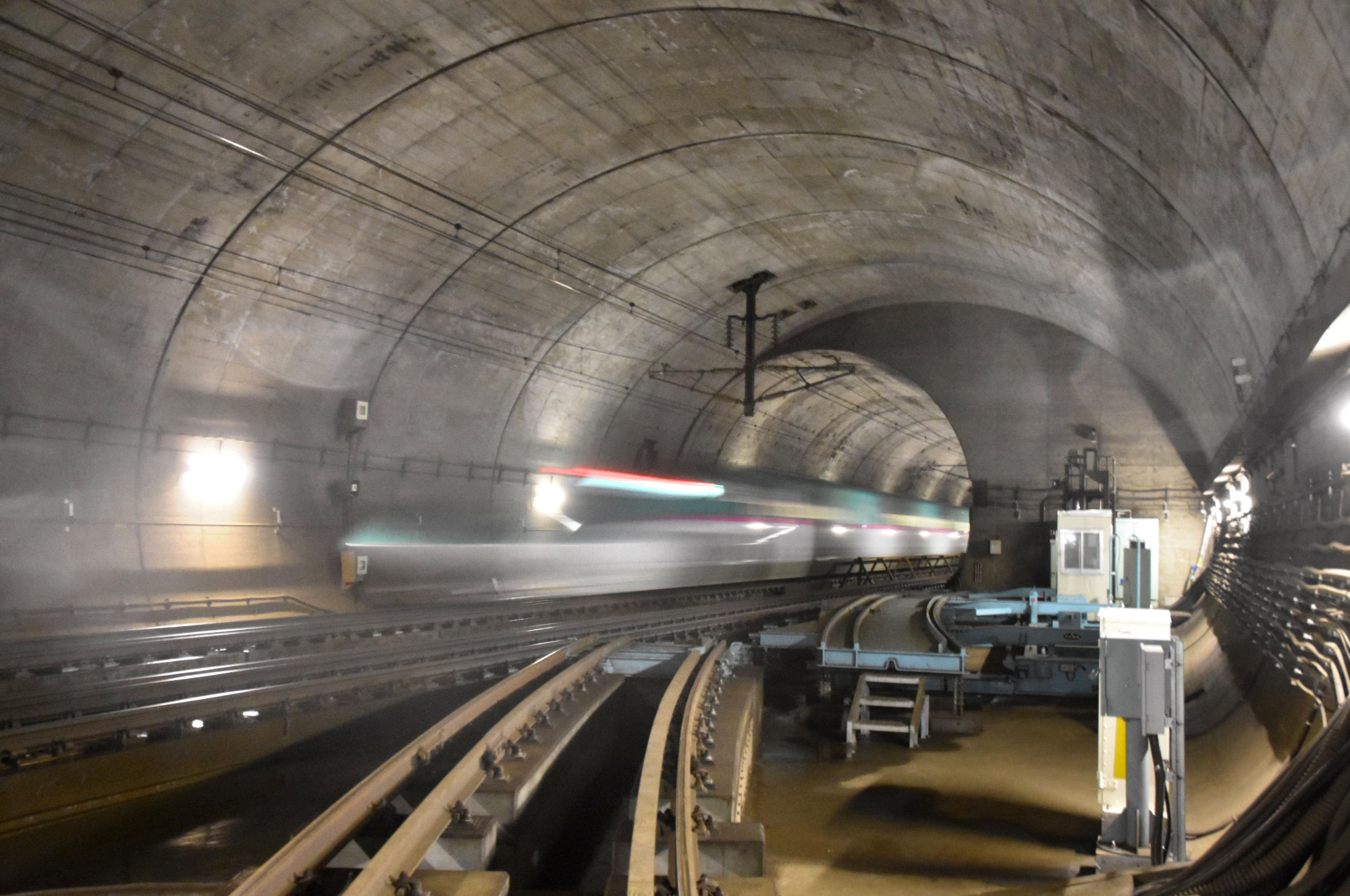 A shinkansen passes through the Seikan Tunnel, which connects Honshu with Hokkaido, in Hakodate, Hokkaido, on Monday. | KYODO