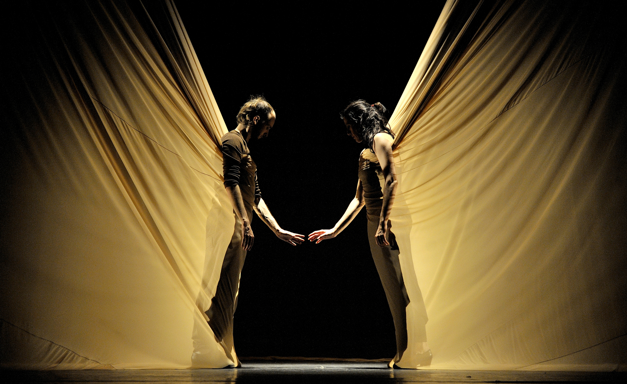 Flickering images: Lights and shadow dance on the material making up the stage set in this scene from 'Dunas' that provides a visually stunning image. | &#169; DAVID RUANO