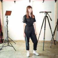 Travelin\' woman:  Emma Felice stands in the Tokyo Creative studios in Shibuya Ward. The 23-year-old has a YouTube channel called Tokidoki Traveler and hosts Tokyo Creative Play, which is part of the Tokyo Creative agency\'s branded sites. | ELLE HARRIS