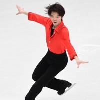 Kazuki Tomono posted career-best scores in the short program and free skate on the way to a fifth-place finish at the world championships in Milan on Saturday. AFP-JIJI | AFP-JIJI