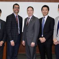 Members of the research project on college sports in Japan (from left) University of Tsukuba associate professor Tsuyoshi Matsumoto, Temple professors Jeremy Jordan and Daniel Funk, Yuhei Inoue, an assistant professor at the University of Minnesota and Shinzo Yamada, an administrator at Tsukuba, pose after their presentations on March 7. | KAZ NAGATSUKA