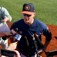 Houston Astros manager A.J. Hinch, addressing the media before a recent spring training workout, guided the AL West ballclub to its first World Series title last season. | USA TODAY / VIA REUTERS