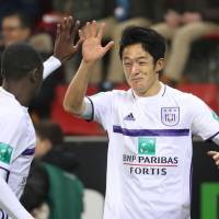 Ryota Morioka celebrates with an Anderlecht teammate after scoring in Saturday\'s 3-2 win over Zulte-Waregem. | KYODO