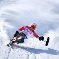 Momoka Muraoka competes in the women\'s downhill at the Pyeongchang Winter Paralympics on Saturday. Muraoka earned the silver medal in the event. KYODO | OSCAR BOYD