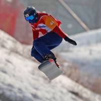 Gurimu Narita competes in the men\'s snowboard cross SB-LL2  competition at Jeongseon Alpine Centre during the Pyeonchang Paralympics on Monday. Narita earned bronze. | REUTERS