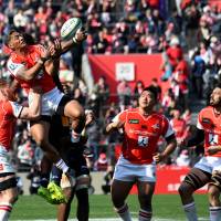 Timothy Lafaele (second from left) and the Sunwolves are back in action on Saturday against the Melbourne Rebels. | AFP-JIJI