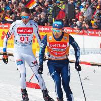 Akito Watabe (right) competes in a Nordic combined World Cup race in Schonach, Germany, on Sunday. | KYODO