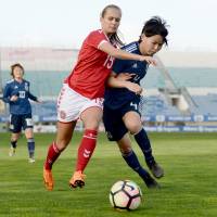 Denmark\'s Frederikke Thogersen (left) competes with Japan\'s Saki Kumagai in an Algarve Cup match on Monday. Japan won 2-0. | GETTY / VIA KYODO