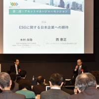 Naonori Kimura, partner and managing director at Industrial Growth Platform, Inc., and Yasumasa Nishi, then-president and CEO of Asset Management One Co., at a forum organized by The Japan Times on March 12 in Tokyo. | YOSHIAKI MIURA