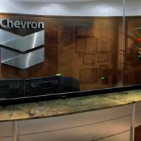 The logo of Chevron is seen at the company\'s office in Caracas Wednesday. | REUTERS