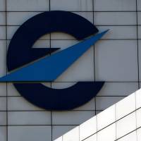 The logo of Eurocontrol, Europe\'s air traffic regulator, is seen on the facade of its headquarters in Brussels in 2014. | REUTERS
