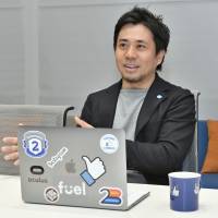 Shin Hasegawa, managing director of Facebook Japan, is interviewed on Tuesday at Facebook\'s offices in Tokyo. | YOSHIAKI MIURA
