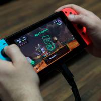 Nintendo Co.\'s Switch game console is the centerpiece of a tie-up between the video game giant and San Francisco-based Scrum Ventures. | BLOOMBERG