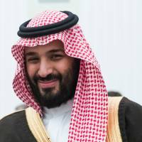 Saudi Deputy Crown Prince and Defense Minister Mohammed bin Salman visits Moscow\'s Kremlin last May. AMC says it will open Saudi Arabia\'s first movie theater on April 18. Cinema operators are rushing to build theaters in the Gulf kingdom. The Saudi government in December said it would open the country to commercial movie theaters for the first time in more than 35 years. | AP