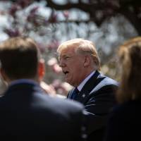 U.S. President Donald Trump speaks during an event on tax policy in the Rose Garden of the White House in Washington on Thursday. He told lawmakers he is considering rejoining the Trans-Pacific Partnership, the free-trade deal from which he withdrew shortly after taking office. | BLOOMBERG