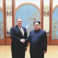 Then-CIA Director Mike Pompeo meets with North Korean leader Kim Jong Un in Pyongyang over Easter weekend. | U.S. GOVERNMENT / VIA REUTERS