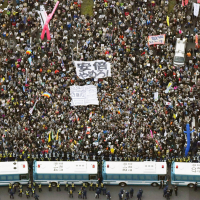 Protesters rally outside the Diet on Saturday during a demonstration against Prime Minister Shinzo Abe. | KYODO