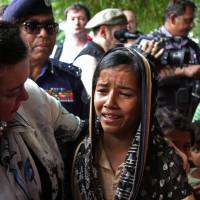 British United Nations Ambassador Karen Pierce consoles a a 12-year-old Rohingya refugee near Cox\'s Bazar, in Bangladesh Sunday. | REUTERS