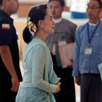 Myanmar\'s state counsellor, Aung San Suu Kyi, arrives at Parliament in Naypyitaw Friday. | REUTERS
