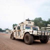 The Portuguese contingent of the U.N. mission in the Central African Republic (MINUSCA) that attacked the Muslim self-defence group of the PK5, a Muslim-majority neighborhood of Bangui, is seen patrolling, in Bangui on Sunday. | AFP-JIJI