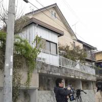 Yoshitane Yamasaki, seen in this photo taken on Saturday, is suspected of confining his 42-year-old son in a wooden cage inside a prefabricated hut next to his house in Sanda, Hyogo Prefecture, for over 20 years. | KYODO