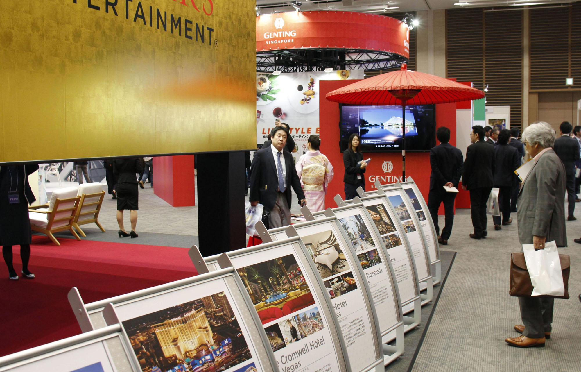 Visitors attend an integrated resorts trade show at Grand Front Osaka on Friday. | KYODO