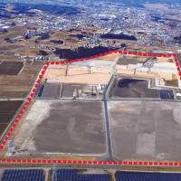 Facilities that will be part of the Fukushima Robot Test Field are seen under construction (within dotted line) in the Haramachi district of Minamisoma, Fukushima Prefecture. Part of the facility is to be completed by June. | FUKUSHIMA MINPO