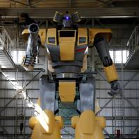 Bipedal robot Mononofu, 8.5 meters tall, is displayed at Sakakibara Kikai\'s factory in Shinto, Gunma Prefecture, on Thursday. | REUTERS