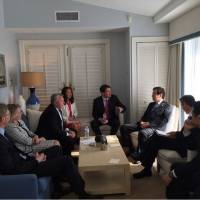 U.S. Ambassador to Japan William Hagerty (center) speaks with Japanese and U.S. officials at Donald Trumps Mar-a-Lago estate in Florida on Wednesday. | U.S. STATE DEPARTMENT