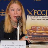 Catherine Jane Fisher, an Australian human rights activist who was raped by a U.S. military serviceman 16 years ago in Japan, speaks during a news conference at the Foreign Correspondents\' Club of Japan on Thursday. | CHISATO TANAKA