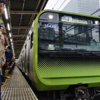 A new Yamanote Line train model is seen at Osaki Station in March 2016 in Tokyo. | KYODO