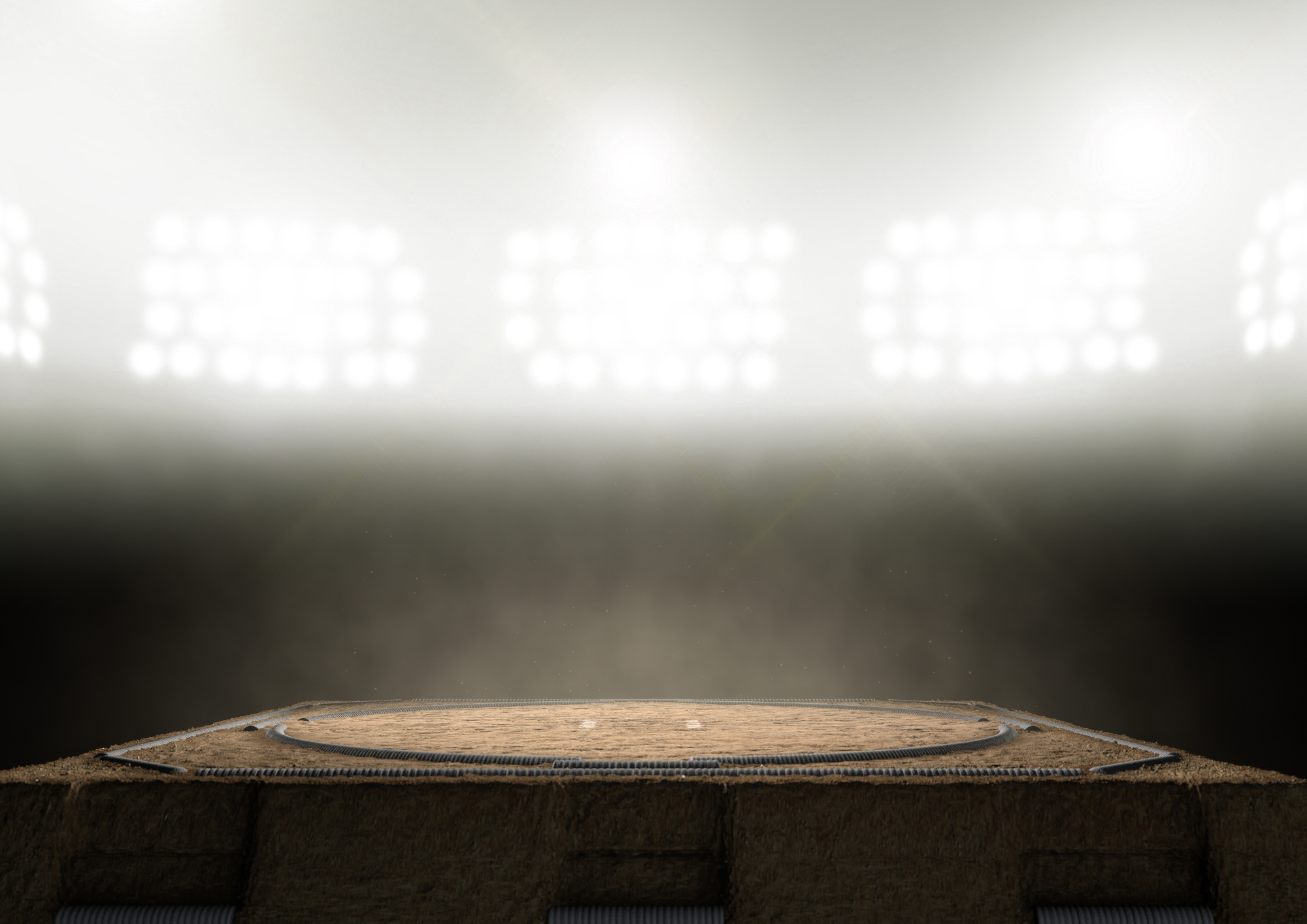 An illuminated dohyō (sumo ring) is portrayed in a 3D rendering. A recent emergency involving Maizuru Mayor Ryozo Tatami, who collapsed within the dohyō (sumo ring), has sparked national debate over the sumo tradition of banning women from entering the “sacred” ring. | GETTY IMAGES