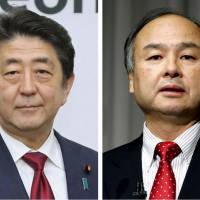 Prime Minister Shinzo Abe (left) and SoftBank Group Corp. Chairman Masayoshi Son were selected for the world\'s 100 Most Influential People of 2018 by Time magazine. | KYODO