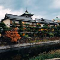 Historic accomodation: K\'s house (right) and the neighboring Tokaikan cultural site (left) as seen from the opposite side of the Matsukawa River in Ito, Shizuoka Prefecture. | ANDREW CURRY