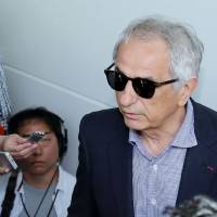 Former Japan men\'s soccer manager Vahid Halilhodzic speaks to journalists at Haneda airport on Saturday. | AFP-JIJI