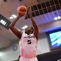 Mikawa center Isaac Butts puts up an inside shot in second-quarter action on Sunday. Butts finished with 16 points and a game-high 17 rebounds. | B. LEAGUE