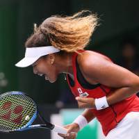 Japan\'s Naomi Osaka reacts during her Fed Cup singles match against Britain\'s Johanna Konta on Sunday in Miki, Hyogo Prefecture. | AFP-JIJI