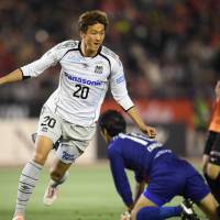 Gamba Osaka\'s Shun Nagasawa celebrates after scoring one of his four first-half goals against Nagoya Grampus in a Levain Cup match on Wednesday. Gamba won 4-1. | KYODO