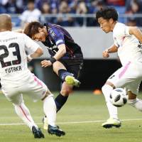 Hwang Ui-jo scores Gamba Osaka\'s second goal in their 3-0 win over Sagan Tosu in the J. League on Sunday at Suita Stadium. | KYODO