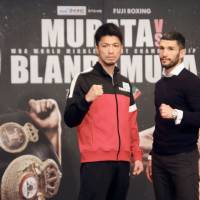 WBA middleweight champion Ryota Murata and challenger Emanuele Blandamura pose at a news conference on Friday ahead of Sunday\'s title bout in Yokohama. | KAZ NAGATSUKA