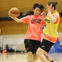 Mio Shinozaki (left) competes during a training camp for the provisional Japan women’s national team in Tokyo on Tuesday. | KAZ NAGATSUKA