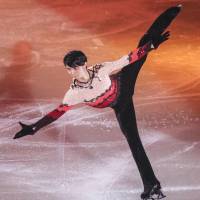 Two-time Olympic champion Yuzuru Hanyu skates in his show \'Continues with Wings\' on Friday night in Tokyo. | KYODO