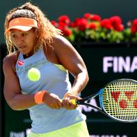 Naomi Osaka, seen in a file photo from  the BNP Paribas Open last month, defeated Jennifer Brady 6-4, 6-4 on Monday in the women\'s singles first round at the Charleston Open. | USA TODAY / VIA REUTERS