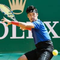 Yuichi Sugita prepares to hit a shot during his Monte Carlo Masters match against Jan-Lennard Struff on Tuesday. | KYODO